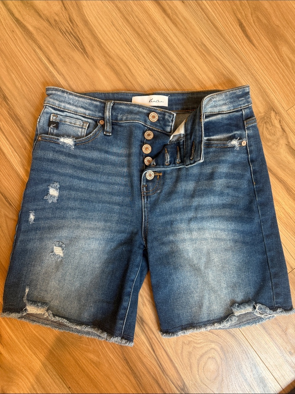KanCan Distressed Mid-Blue Button-Front Denim Shorts 6 1/2” inseam